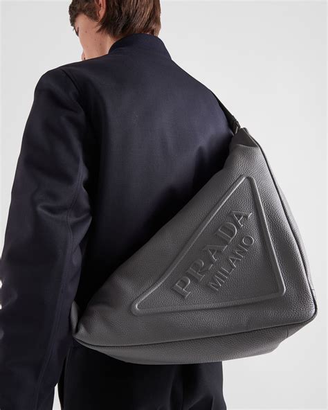 prada leather triangle bag.